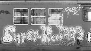 Old graffiti piece painted on a train wagon. 