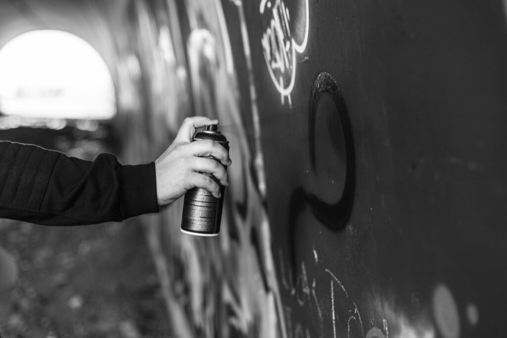 spraying paint with an aerosol can 